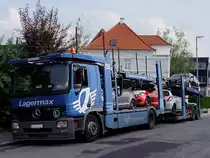 ACTROS von Lagermax hat eine Ladung Fahrzeuge f�r einen Gebrauchtwagenh�ndler in Ried i.I. herangeschafft;100811