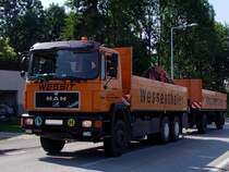 MAN 33-402Commander ist Richtung Firmenzentrale unterwegs;100810