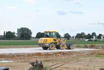 Radler von Komatsu, in Lehrte am 18.08.2010.