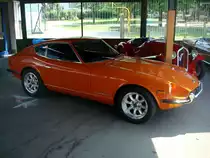 Datsun 240Z,
der japanische Sportwagen aus dem Jahr 1970 hat einen 6-Zyl.Motor mit
2400ccm und 131PS,
Oldtimertreffen Gundelfingen/Brsg.Juni 2010