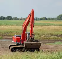 Raupenbagger O&K RH6 auf einer Baustelle am Ems-Jade-Kanal