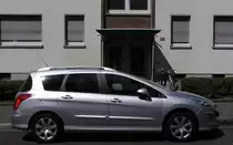 Peugeot 308 Kombiversion.  Gesehen: Juli 2010.