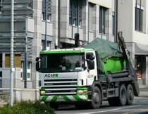 Scania 114G 380 Muldentransporter unterwegs in Zug am 20.08.2010