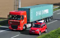 DAF XF  Transport Gebr. De Bock  mit Container auf der A61 bei Weilerswist - 06.09.2010