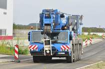 nicht das ich Jagd auf sie machte, aber sie fuhren mir des fteren in die Linse, DEMAG-Kran vom Krandienst Lange kommt aus dem Stralsunder Sdhafen am 14.09.2010