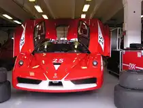Ferrari FXX mit ge�ffneten Motorhaube und T�re, im Paddock Hungaroring. Ferrari Racing Days 2010, September.