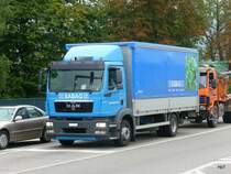 MAN mit Pritschenaufbau unterwegs in olten am 07.09.2010