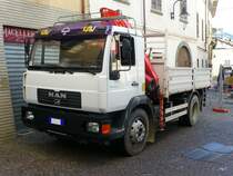 MAN LE220B Kipper in Tirano (I) am 15.09.2010