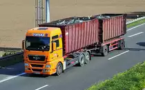 MAN TGX 18.440 mit Metallschrott (Spedition Transka) auf der A61 bei Weilerswist - 06.09.2010