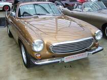 Volvo P1800 E. 1969 -1972. Der P1800 wurde schon 1961 vorgestellt. Hier wurde ein Fahrzeug der letzten Serie mit dem 1.986 cm� Motor mit 124 PS und einer Bosch-D Jetronic Einspritzanlage abgelichtet. Die Spitzengeschwindigkeit soll 190 km/h betragen haben. Von diesem h�bschen Coupe sind 39.407 Einheiten von den B�ndern bei Jensen/GB (bis 1963) und im Volvo-Stammwerk Lundby vom Band gelaufen sein. Meilenwerk D�sseldorf.