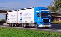 Scania R 420  De Weerd  auf der A61 bei Miel - 04.10.2010