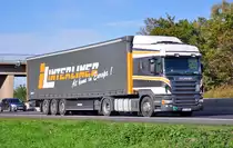 Scania R 580 auf der A61 bei Miel - 04.10.2010