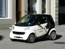 Schwarz - Weisser Smart mit werbung in Langnau am 29.10.2010