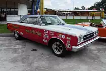 Ein Plymouth Belvedere GTX um 1967 im Renndress zu sehen auf der US-Car-Show in Grefrath im August 2010.