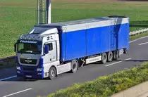 MAN mit Pritschenauflieger  F�chtener , A61 Rheinbach 21.10.2010