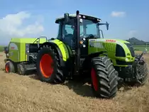 Claas Arion 640, Allradschlepper, 6-Zyl.Turbo-Diesel, 6788ccm, 155PS, 
angeh�ngt eine Ballenpresse von Claas, Traktorentreffen Hausen/M�hlin, Sept.2010