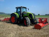 Claas Axion 810, Allradschlepper, 6-Zyl.Turbo-Diesel, 6788ccm, 176PS, 
mit Fronthcksler und Zinkenegge hinten, Traktorentreffen Hausen/Mhlin, Sept.2010