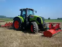 Claas Axion 810, Allradschlepper, 6-Zyl.Turbo-Diesel, 6788ccm, 176PS, 
mit Fronth�cksler und Zinkenegge hinten, Traktorentreffen Hausen/M�hlin, Sept.2010