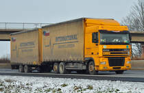 DAF 95XF Tandemzug Pritsche - auf der A61 bei Miel 03.12.2010