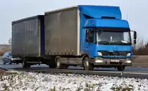 MB Atego 822 Tandemzug auf der A61 bei Miel - 03.12.2010