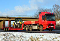 MB Actros 3358 Tieflader auf der A61 bei Miel - 15.12.2010