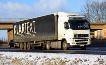 Volvo FH 440  Spedition Maassen  auf der A61 bei Miel - 15.12.2010