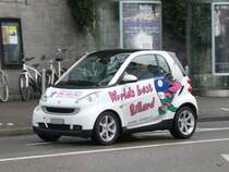 Smart mit Werbung unterwegs in der Stadt Zrich am 29.12.2010