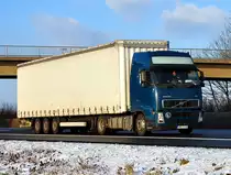 Volvo FH 440 Pritschenauflieger, A61 bei Miel 15.12.2010
