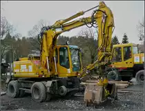 Zweiwegebagger Atlas 1604 ZW aufgenommen nahe der Baustelle am Bahn�bergang in Wilwerwiltz am 07.11.2009.