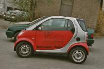 SMART - Werbesmart des Barwagen - Team der Bimmelbahn Zittauer Gebirge in Zittau am 26.11.2004