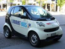 SMART - Werbesmart ZH 728921 fr den V der Limmat Bus und BD - WM Bahnen in Dietikon am 10.05.2007