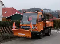 Obwohl am 21.Januar 2011 nicht viel Schnee in Bergen/R�gen lag,hatte dieser Multicar seinen Schneeschieber nicht abmontiert.