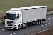 MAN TGX 18.460 auf der A61 bei Miel - 26.01.2011