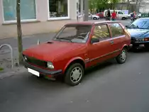 Yugo 65 EFi, Frontansicht, gesehen 07/2005 in Berlin.