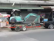 Ein KOBELCO SK025 Minibagger auf einem Hnger am 14.02.2011 in Buri Ram / Thailand