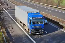 MAN Pritschenauflieger  Mulit-Truck-Center  auf der A61 bei Rheinbach - 17.02.2011