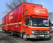 1.03.2011:  Mercedes-Atego 1223 -  f�r Transporte Gr�ters als H�ngerzug unterwegs -