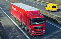 MAN Pritschenauflieger aus Polen  Cesped , A61 bei Rheinbach - 17.02.2011