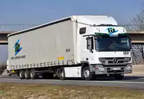 MB Actros 1841  lit  auf der A61 bei Miel - 04.03.2011
