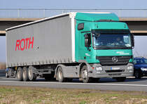 MB Actros 1841  Roth Spedition  auf der A61 bei Miel - 04.03.2011