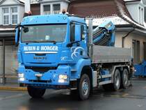 MAN mit Lastkran und Pritsche in Interlaken am 25.02.2011