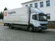 Mercedes am 11.Mrz 2011 vor einem Bckerladen in Bergen/Rgen.