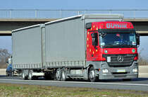 MB Actros 2541 Tandemzug  Transport Gutnik  auf der A61 bei Miel - 04.03.2011