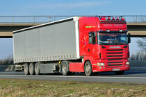 Scania R 470  Kraichtal-Transporte  auf der A61 bei Miel - 17.02.2011