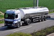 MB Actros 1844  Geuyen-Rennings Milchtransporte  auf der A61 Weilerswist - 29.03.2011