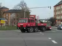 Tatra 815 der Firma Scholpp passiert am 06.04.2011 den Chemnitzer Thomas-Mann-Platz.