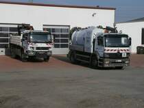 Vor einem Autohaus in Bergen/R�gen standen am 16.April 2011:Mercedes-Kipper und ein Mercedes von der Wasserversorgung.