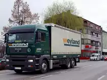 MAN TGA26.400 eines Stahl-Eisengro�h�ndler begibt sich auf die Heimreise;110401