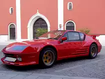 RENAULT-Alpine,A310 vor den Pforten der Rieder Stadtpfarrkirche;110416