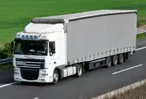 DAF XF 105.410 Pritschenauflieger auf der A61 bei Miel - 28.04.2011